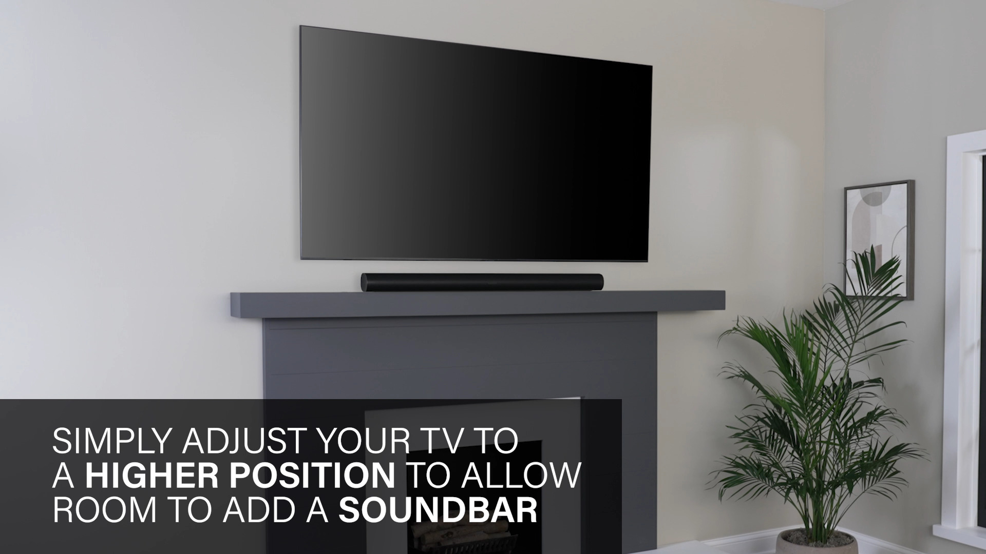 Shows arrows going up to make room for soundbar under TV