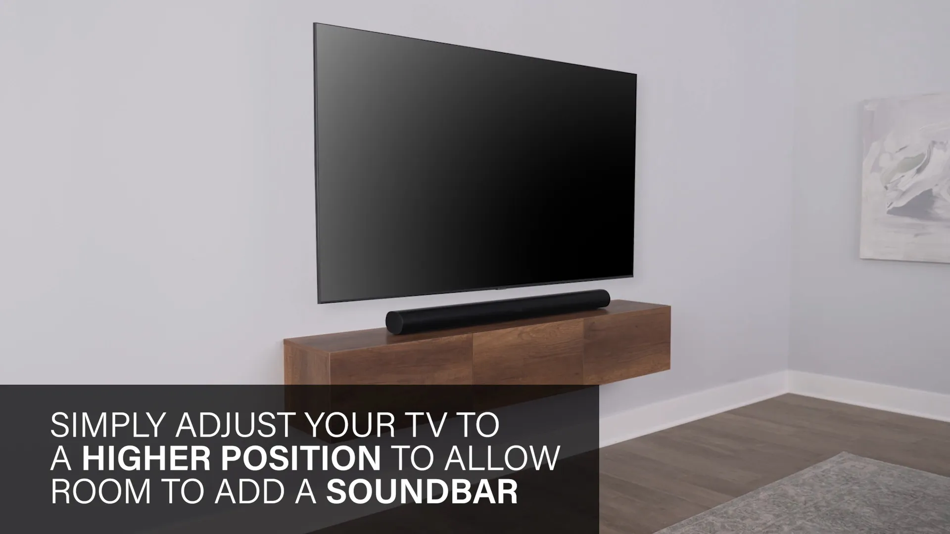 Shows arrows going up to make room for soundbar under TV